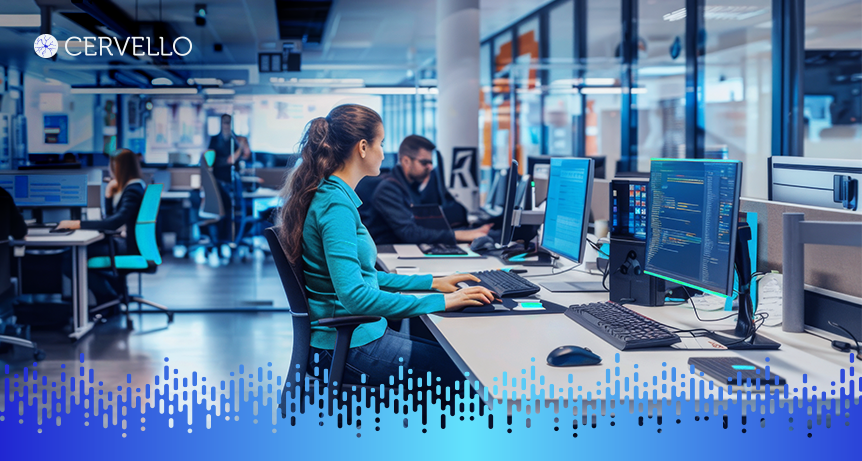 Imagem de uma equipe de profissionais trabalhando em um ambiente de escritório moderno, utilizando computadores para oferecer serviços integrados de tecnologia e suporte